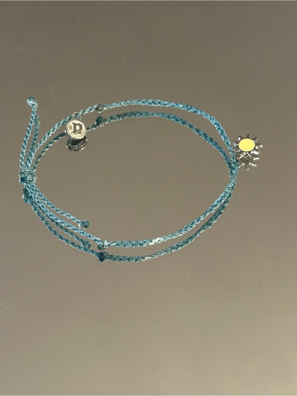 Pura Vida Teal Braided Cord Bracelet with Yellow Sun Charm - Picture 3 of 6